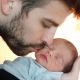 Gerard Pique seen with his newborn son Milan on February 4, 2013
