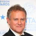 Hugh Bonneville poses in the winners room at the National Television Awards at 02 Arena in London on January 23, 2013