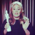 Adele accepts her Best British Single Award via satellite at The Brit Awards 2013 at The O2 Arena on February 20, 2013