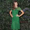 Miranda Kerr in a green lace dress at the QVC Red Carpet Style Party held at Four Seasons Hotel in Beverly Hills, Calif., on February 22, 2013