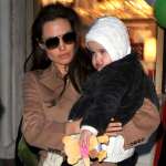 Angelina Jolie visits Lee’s Art Shop with Vivienne Jolie-Pitt on December 4, 2010 in New York City