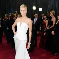 Charlize Theron arrives at the Oscars on February 24, 2013 in Hollywood, Calif.