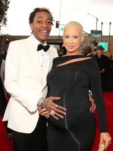 Wiz Khalifa and a very pregnant Amber Rose attend the 55th Annual GRAMMY Awards at STAPLES Center on February 10, 2013 in Los Angeles