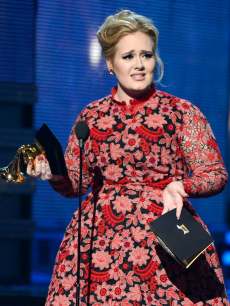Adele accepts Best Pop Solo Performance for ‘Set Fire to the Rain (Live)’ onstage at the 55th Annual Grammy Awards at Staples Center in Los Angeles on February 10, 2013
