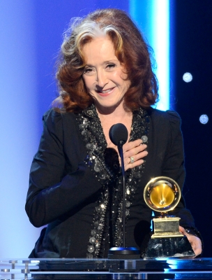 Bonnie Raitt accepts Best Americana Album for ‘Slipstream’ onstage at the The 55th Annual Grammy Awards at Nokia Theatre, Los Angeles, on February 10, 2013
