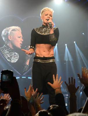 Pink shows off her incredible abs during her ‘The Truth About Love’ tour opener at US Airways Center in Phoenix, AZ, on February 13, 2013