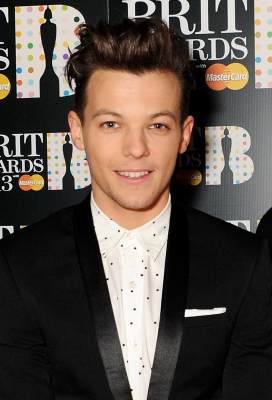 Louis Tomlinson of One Direction arrive at the BRIT Awards 2013 at the O2 Arena, London, on February 20, 2013