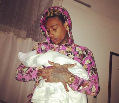 Wiz Khalifa with baby Sebastian Taylor Thomaz