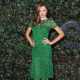 Miranda Kerr in a green lace dress at the QVC Red Carpet Style Party held at Four Seasons Hotel in Beverly Hills, Calif., on February 22, 2013