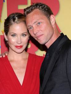 Christina Applegate and Martyn Lenoble arrive at Women in Film Presents The 2012 Crystal + Lucy Awards in Los Angeles, California, on June 12, 2012