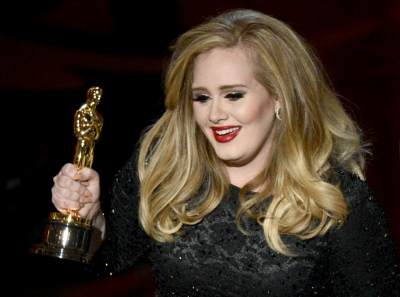 Adele accepts the Best Original Song award for ‘Skyfall’ onstage during the Oscars held at the Dolby Theatre in Hollywood on February 24, 2013