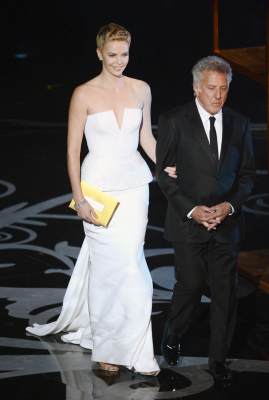 Charlize Theron and Dustin Hoffman present onstage during the Oscars held at the Dolby Theatre in Hollywood on February 24, 2013 