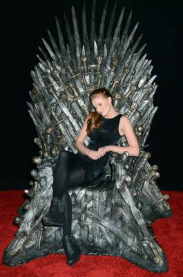 Sophie Turner (Sansa Stark) sits on the Iron Throne at the Academy of Television Arts & Sciences an evening with HBO’s ‘Game Of Thrones’ event at TCL Chinese Theatre on March 19, 2013