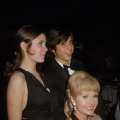Carrie Fisher stands with her mother. Debbie Reynolds, and her brother Todd Fisher at the premiere party for their new play ‘Irene,’ at Raffles, New York, March 13, 1973