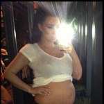 Kim Kardashian shows off her baby belly, April 6, 2013