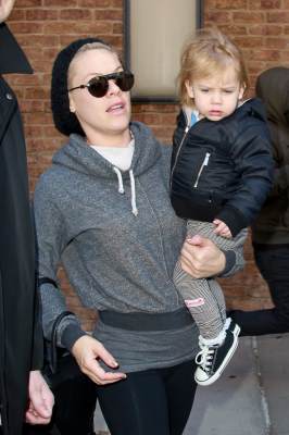 Pink carries her daughter Willow out of the Greenwich Hotel as they set out in New York City on March 27, 2013