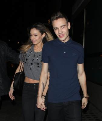 Danielle Peazer and One Direction’s Liam Payne at Whiskey Mist night club on April 2, 2013 in London