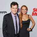 Charlie Sheen and Lindsay Lohan arrive at the premiere ‘Scary Movie V’ at ArcLight Cinemas Cinerama Dome on April 11, 2013 in Hollywood, Calif.