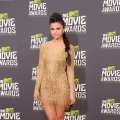 Selena Gomez arrives at the 2013 MTV Movie Awards at Sony Pictures Studios in Culver City, Calif., on April 14, 2013