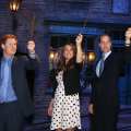 Prince Harry, Catherine, Duchess of Cambridge and Prince William, Duke of Cambridge raise their wands on the set of the Harry Potter Films during the Inauguration Of Warner Bros. Studios Leavesden on April 26, 2013 in London, England