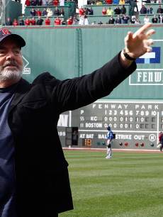 Neil Diamond sings ‘Sweet Caroline’ during a game between the Kansas City Royals and Boston Red Sox in the 8th inning at Fenway Park in Boston on April 20, 2013