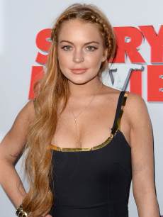 Lindsay Lohan arrives at the ‘Scary Movie 5’ premiere at the ArcLight Cinemas Cinerama Dome on April 11, 2013 in Hollywood, Calif.