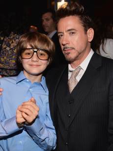 Ty Simpkins and Robert Downey Jr. attend Marvel’s ‘Iron Man 3’ premiere after party at Hard Rock Cafe on April 24, 2013 in Hollywood, Calif.