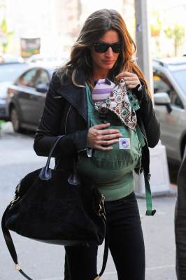 Gisele Bundchen carries her daughter Vivian Lake Brady on May 3, 2013 in New York City