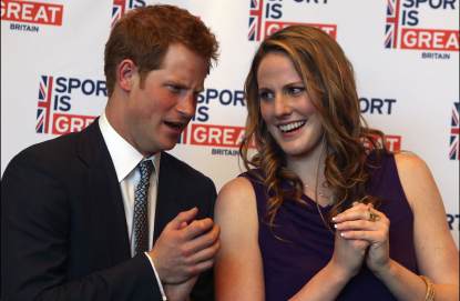 Prince Harry chats with Missy Franklin at a reception at the Sanctuary Golf Course on May 10, 2013 in Sedalia, Colorado