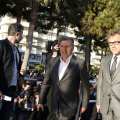 French actor and member of the Feature Film Jury Daniel Auteuil (C) and Austrian actor and member of the Feature Film Jury Christoph Waltz arrive to take part in the TV show ‘Le Grand Journal’ on the set of French TV Canal+ during the 66th Cannes film festival on May 17, 2013 in Cannes
