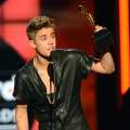 Justin Bieber accepts the award for ‘Top Male Artist’ onstage during the 2013 Billboard Music Awards at the MGM Grand Garden Arena on May 19, 2013 in Las Vegas