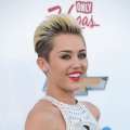 Miley Cyrus arrives at the 2013 Billboard Music Awards at the MGM Grand Garden Arena on May 19, 2013 in Las Vegas