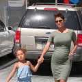 Pregnant Halle Berry holds hands with daughter Nahla while out and about in Los Angeles on May 24, 2013