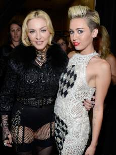 Madonna and Miley Cyrus attend the 2013 Billboard Music Awards at the MGM Grand Garden Arena on May 19, 2013 in Las Vegas