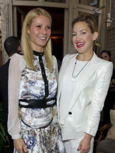 Gwyneth Paltrow and Kate Hudson pose at Goop’s party to launch the summer season, at Mark’s Club on May 21, 2013 in London, England