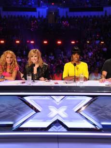 The judges’ panel for ‘The X Factor’ Season 3 — Paulina Rubio, Demi Lovato, Kelly Rowland and Simon Cowell
