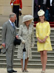 Prince Charles, the Prince of Wales, Camilla, the Duchess of Cornwall and Catherine, the Duchess of Cambridge attend a Garden Party in the grounds of Buckingham Palace, central London on May 22, 2013