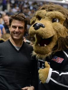 Tom Cruise poses for a picture with Los Angeles Kings mascot in Game Five of the Western Conference Semifinals during the 2013 Stanley Cup Playoffs at Staples Center on May 23, 2013 in Los Angeles
