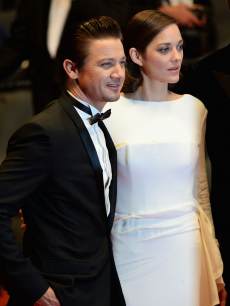 Jeremy Rennerand Marion Cotillard leave ‘The Immigrant’ Premiere during the 66th Annual Cannes Film Festival at Grand Theatre Lumiere on May 24, 2013 in Cannes, France