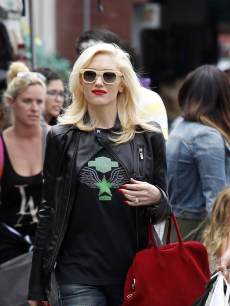 Gwen Stefani sports a black leather jacket and red bag for a trip to Chinatown in Los Angeles on May 24, 2013