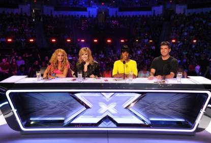The judges’ panel for ‘The X Factor’ Season 3 — Paulina Rubio, Demi Lovato, Kelly Rowland and Simon Cowell