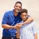 Will Smith poses with his son and co-star Jaden Smith outside the main entrance of Spaceport America the ‘After Earth’ press junket on May 17, 2013