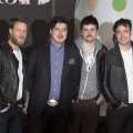Ted Dwane, Marcus Mumford, Winston- Marshall, and Ben Lovett of Mumford & Sons attend the Brit Awards 2013 at the 02 Arena on February 20, 2013 in London