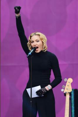 Madonna speaks on stage at the ‘Chime For Change: The Sound Of Change Live’ Concert at Twickenham Stadium on June 1, 2013 in London