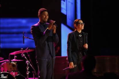 Michelle Chamuel performs with her coach, Usher, on ‘The Voice’