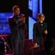 Michelle Chamuel performs with her coach, Usher, on ‘The Voice’