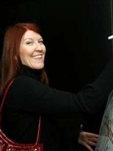 Kate Flannery smiles as she leaves her John Hancock