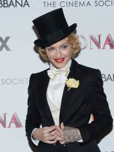 Madonna attends the Dolce & Gabbana and The Cinema Society screening of the Epix World premiere of ‘Madonna: The MDNA Tour’ at The Paris Theatre on June 18, 2013 in New York City