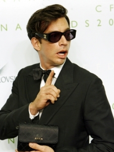 Harry Connick Jr. poses backstage with Anna Wintour glasses
