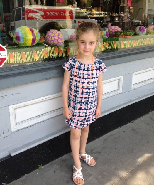 Harlow Patterson — daughter of Glam Slam’s Ryan Patterson — poses in front of a store window in Charleston, S.C. (Access Hollywood)